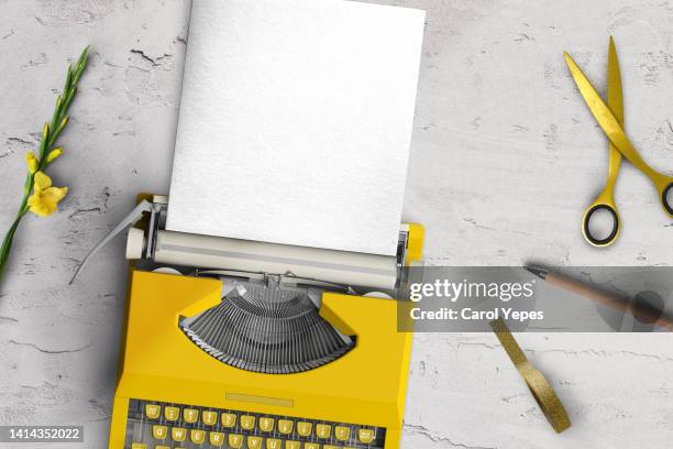 top view of a typewriter from the 70s with blank paper for text, isolated on grey background. - table font view stock pictures, royalty-free photos & images