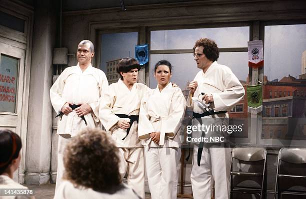 Episode 19 -- Pictured: Joe Piscopo as Curly, Tim Kazurinsky as Moe, Julia Louis-Dreyfus as student, Betty Thomas as student during the 'Karate...