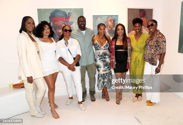 Otishka Ferguson, Lauren Pearce, Megan Lewis, Lance Gross, Mashonda Tifrere, Dana Maire Bullock, Kera Morgan and Estelle attend Mashonda Tifrere's...