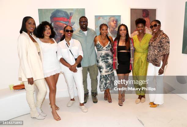 Otishka Ferguson, Lauren Pearce, Megan Lewis, Lance Gross, Mashonda Tifrere, Dana Maire Bullock, Kera Morgan and Estelle attend Mashonda Tifrere's...