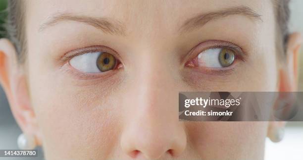 thoughtful woman looking away - pearl earring stock pictures, royalty-free photos & images