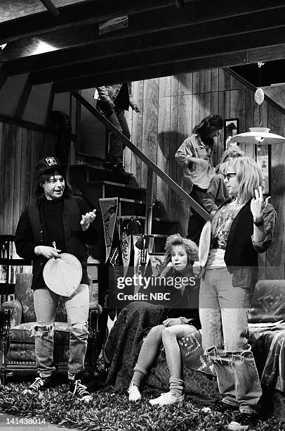 Episode 16 -- Pictured: Mike Myers as Wayne Campbell, Debra Winger as Lisa Hartman, Dana Carvey as Garth Algar during the 'Wayne's World' skit on...