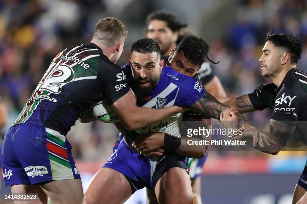 Paul Vaughan of the Bulldogs is tackled during the round 22 NRL match between the New Zealand Warriors and the Canterbury Bulldogs at Mt Smart...