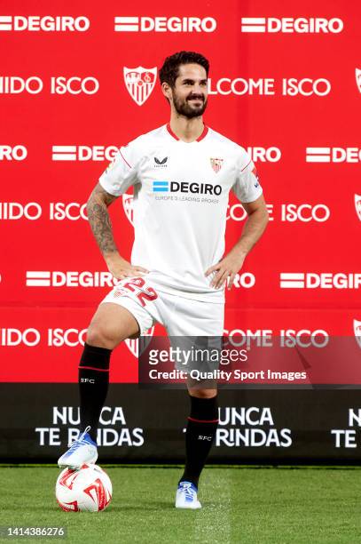 Isco Alarcon of Sevilla FC poses for a photo as he is presented as a Sevilla FC player at Ramon Sanchez Pizjuan on August 10, 2022 in Seville, Spain.
