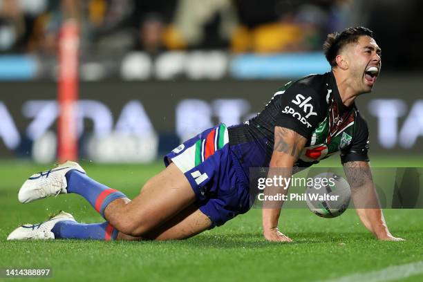 Shaun Johnson of the Warriors celebrates after scoring a try during the round 22 NRL match between the New Zealand Warriors and the Canterbury...