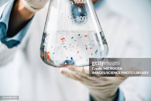 microplastics research, conceptual image - microplastic stock pictures, royalty-free photos & images