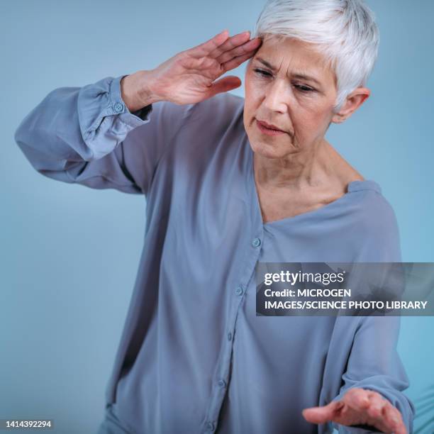 woman with vertigo - vertigo stock pictures, royalty-free photos & images