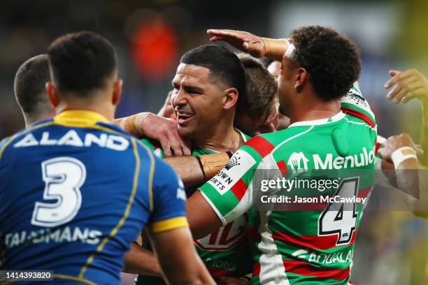 Cody Walker of the Rabbitohs celebrates after scoring a try, which was then disallowed by the video bunker during the round 22 NRL match between the...