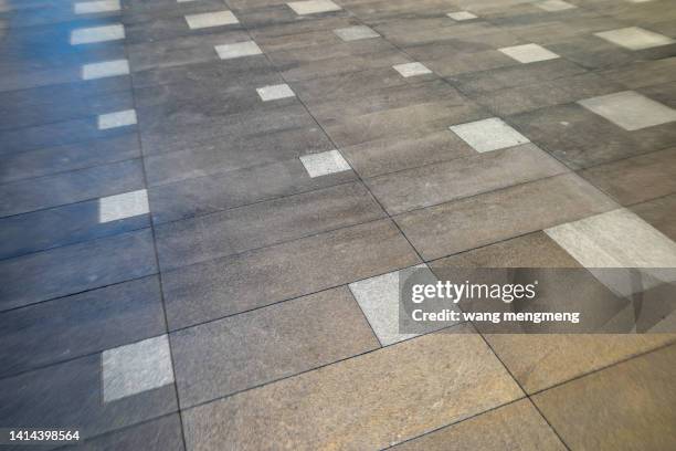 regular floor tiles with square geometry - spelregels stockfoto's en -beelden