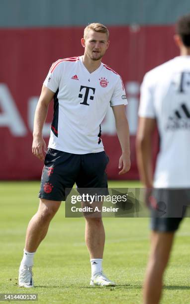 Matthijs de Ligt of FC Bayern Muenchen reacts during a training session of FC Bayern München at Saebener Strasse training ground on August 12, 2022...