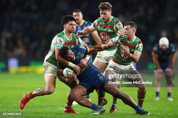 Maika Sivo of the Eels is tackled during the round 22 NRL match between the Parramatta Eels and the South Sydney Rabbitohs at CommBank Stadium on...