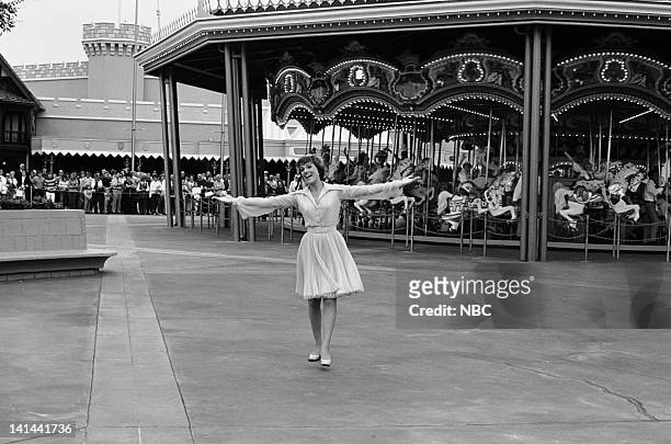 Pictured: Julie Andrews performs in front of Prince Charming Regal Carrousel in the Magic Kingdom, Florida, USA, 13th October 1971.