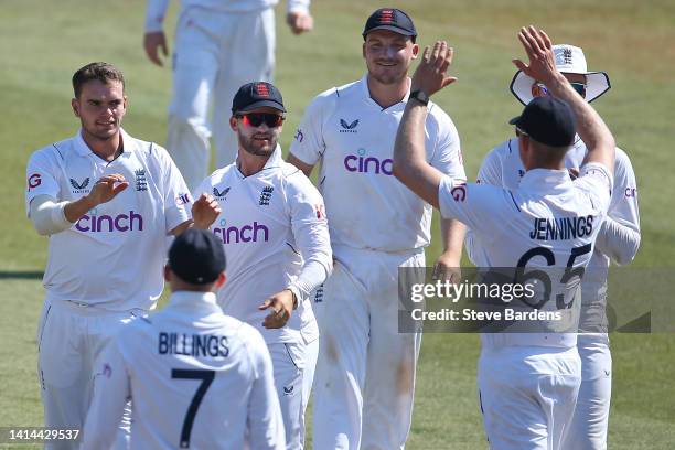 Sam Conners of England Lions celebrates taking the wicket of Marco Jansen of South Africa caught by Sam Billings with his team mates during day four...