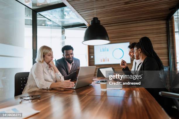 business meeting group of people in meeting room - latin america business stock pictures, royalty-free photos & images