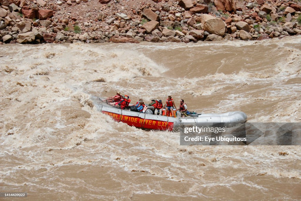 A 33' S-rig raft takes a big hit in Big Drop II, a CLass IV rapid, in Cataract Canyon at high water