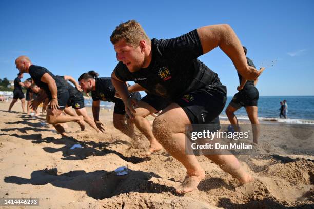 James Kenny of Exeter Chiefs completes a shuttle sprint during a beach training session at Exmouth Beach on August 09, 2022 in Exmouth, England.