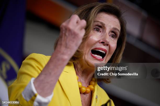 Speaker of the House Nancy Pelosi talks to reporters during her weekly news conference ahead of the vote on the Inflation Reduction Act of 2022 at...