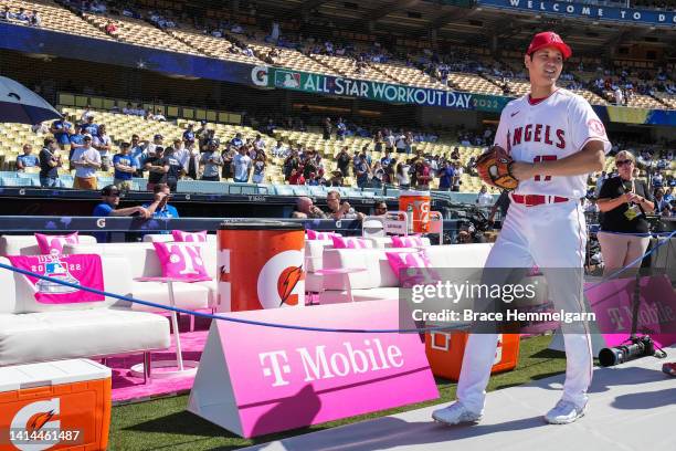 Shohei Ohtani of the Los Angeles Angels looks on during Gatorade All-Star Workout Day at Dodger Stadium on Tuesday, July 18, 2022 in Los Angeles,...