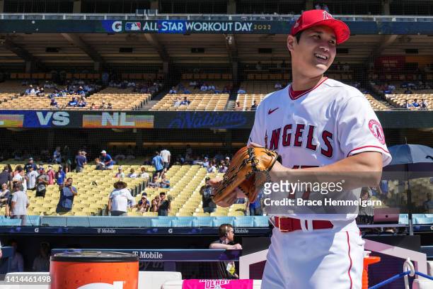 Shohei Ohtani of the Los Angeles Angels looks on during Gatorade All-Star Workout Day at Dodger Stadium on Tuesday, July 18, 2022 in Los Angeles,...