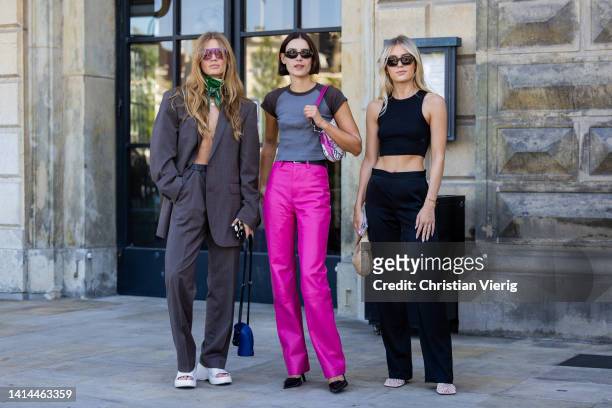 Lois Schindeler seen wearing oversized blazer, scarf, pants, blue bag, white sandals & Vera van Erp wearing pink pants, grey shirt Dior bag &...