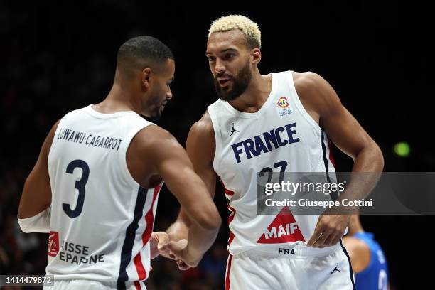 Rudy Gobert of France speaks with Timothe Luwawu-Cabarrot during the basketball International Friendly match between Italy and France at Unipol Arena...