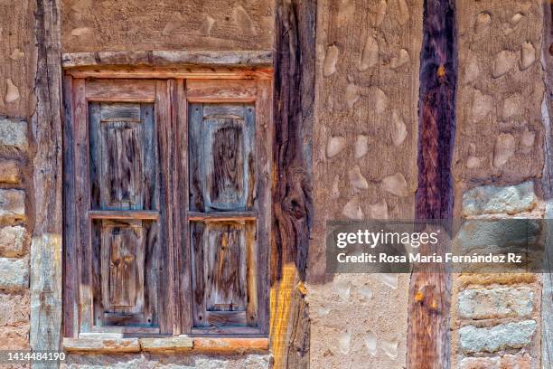 rustic wooden window  of  old abandoned building. - adobe texture stock pictures, royalty-free photos & images