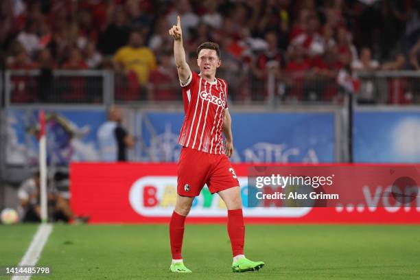 Michael Gregoritsch of SC Freiburg celebrates scoring their side's first goal during the Bundesliga match between Sport-Club Freiburg and Borussia...