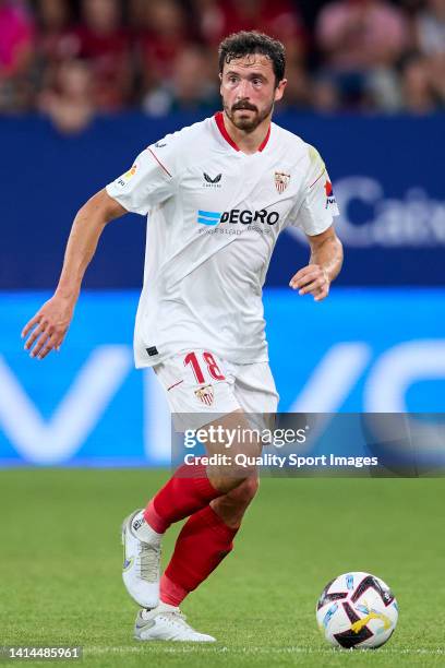 Thomas Delaney of Sevilla FC runs with the ball during the LaLiga Santander match between CA Osasuna and Sevilla FC at El Sadar Stadium on August 12,...