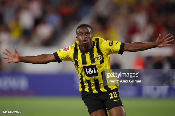 Youssoufa Moukoko of Borussia Dortmund celebrates scoring their side's second goal during the Bundesliga match between Sport-Club Freiburg and...