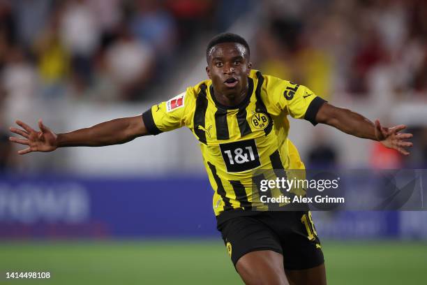 Youssoufa Moukoko of Borussia Dortmund celebrates scoring their side's second goal during the Bundesliga match between Sport-Club Freiburg and...