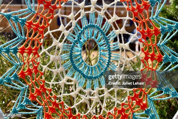 crochet dreamcatcher. - yarn bombing stock pictures, royalty-free photos & images