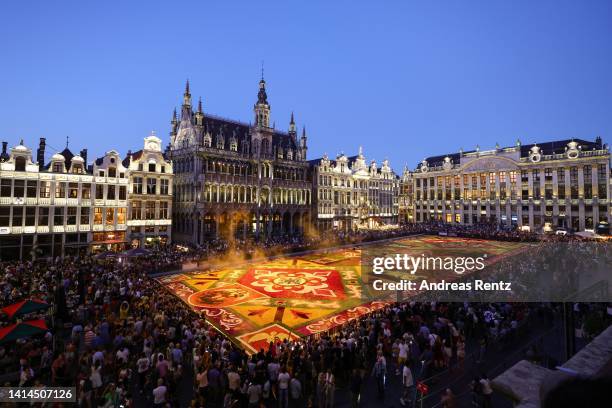 Giant flower carpet stands illuminated within the celebrations to mark its 50th anniversary at Grand Place on August 12, 2022 in Brussels, Belgium....