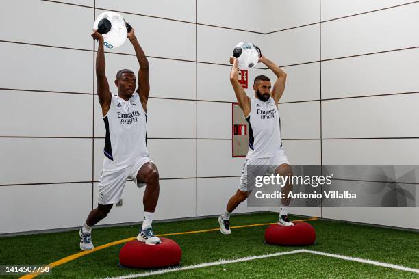 David Alaba and Karim Benzema players of Real Madrid are exercising inside the gym at Valdebebas training ground on August 12, 2022 in Madrid, Spain.