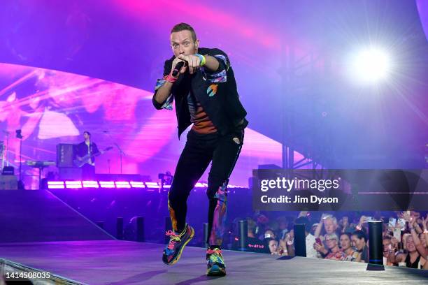 Chris Martin of Coldplay performs on stage at Wembley Stadium during the 'Music of the Spheres' World Tour on August 12, 2022 in London, England.