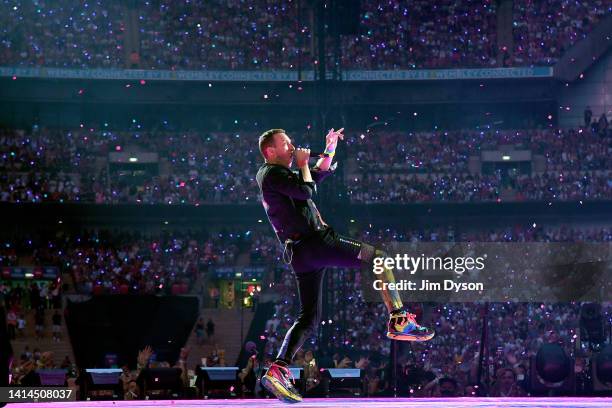 Chris Martin of Coldplay performs on stage at Wembley Stadium during the 'Music of the Spheres' World Tour on August 12, 2022 in London, England.