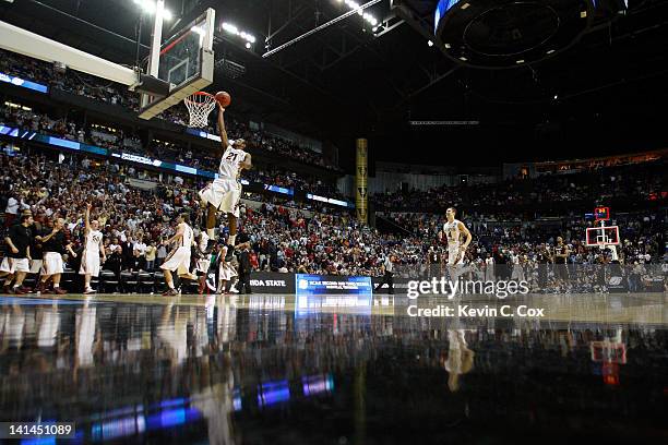 Michael Snaer of the Florida State Seminoles takes a layup after the buzzer against the St. Bonaventure Bonnies during the second round of the 2012...