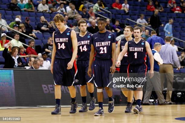 Mick Hedgepeth, J.J. Mann, Ian Clark and Drew Hanlen of the Belmont Bruins walk back on court after a time-out in the second half of the game against...