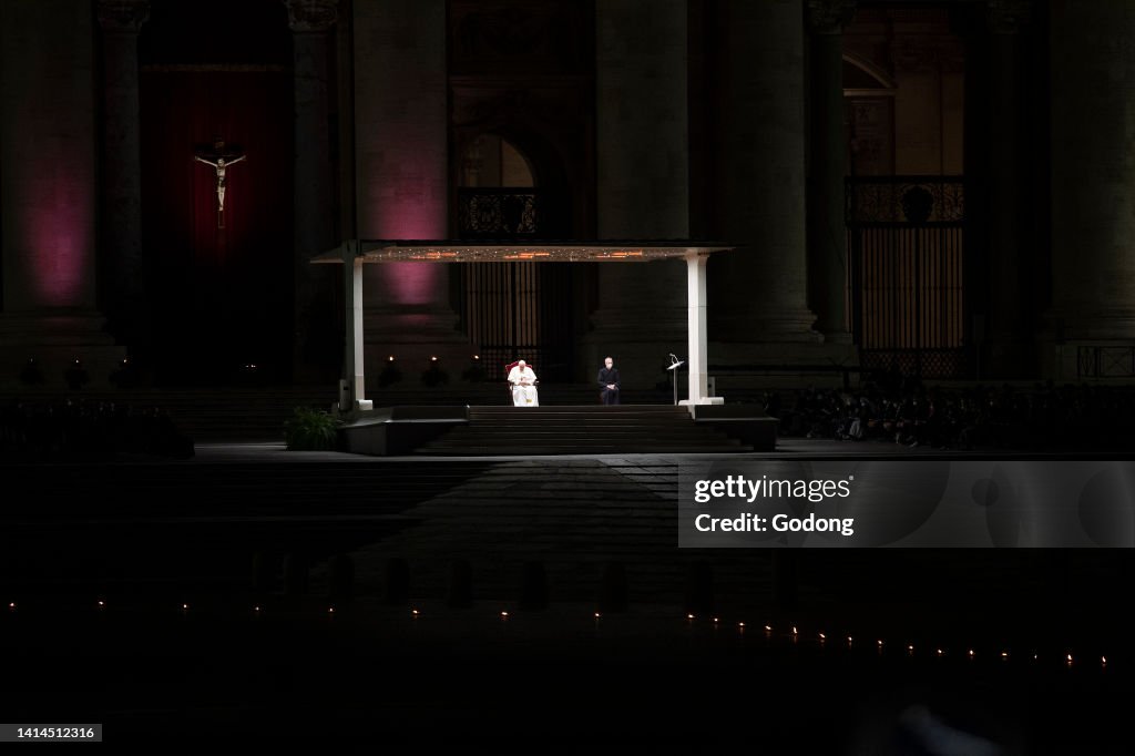 Celebrants walk in St. Peter's Square during the rehearsal of the Via Crucis (Way of the Cross) torchlight procession presided by Pope Francis to commemorate the crucifixion of Jesus Christ