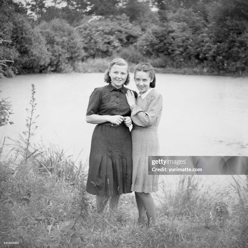 Two women at pond
