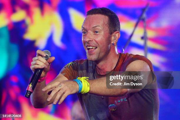 Chris Martin of Coldplay performs on stage at Wembley Stadium during the 'Music of the Spheres' World Tour on August 12, 2022 in London, England.