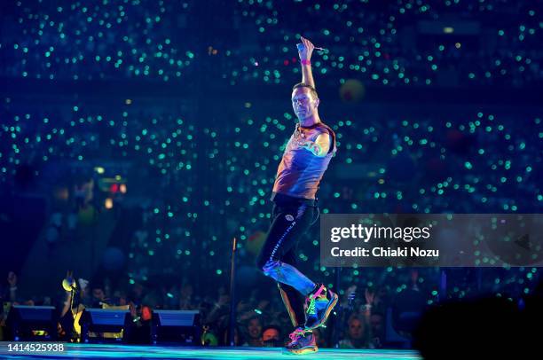 Chris Martin of Coldplay performs at Wembley Stadium on August 12, 2022 in London, England.