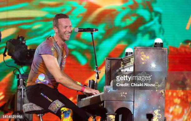 Chris Martin of Coldplay performs at Wembley Stadium on August 12, 2022 in London, England.