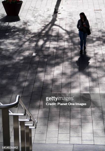 Shadows and silhouettes on London's South Bank 12- a woman.