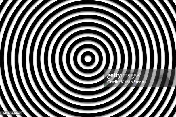 monochrome concentric rings - hypnotherapy stock-fotos und bilder