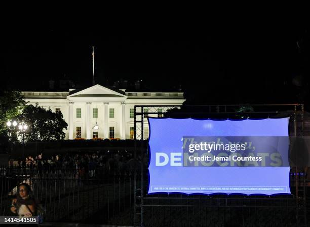 Projection display thanking democrats for the passage of the Inflation Reduction Act is displayed in front of the White House on August 12, 2022 in...