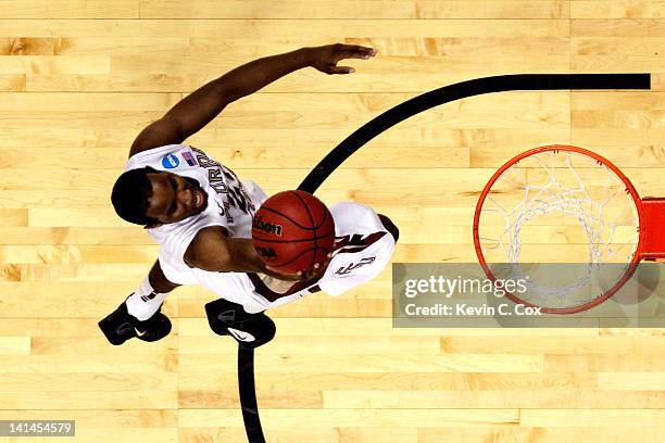 Michael Snaer of the Florida State Seminoles takes a layup after the buzzer against the St. Bonaventure Bonnies during the second round of the 2012...