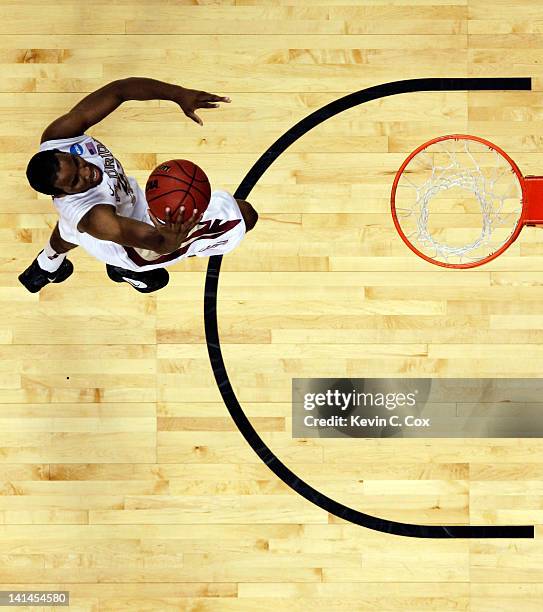 Michael Snaer of the Florida State Seminoles takes a layup after the buzzer against the St. Bonaventure Bonnies during the second round of the 2012...