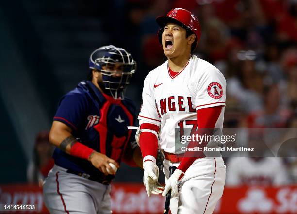 Shohei Ohtani of the Los Angeles Angels reacts after a strike against the Minnesota Twins in the sixth inning at Angel Stadium of Anaheim on August...