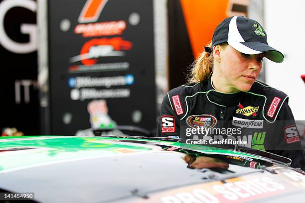 Candace Muzny, driver of the Arrow Wrecker/Titan Project Toyota, looks on during practice for the NASCAR K&N Series Widow Wax 125 presented by Seal...