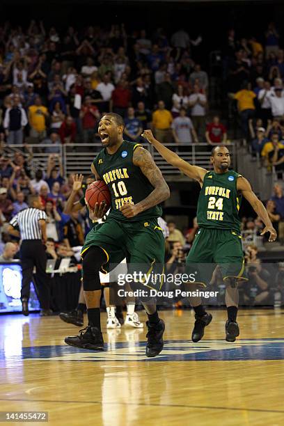 Kyle O'Quinn and Brandon Wheeless of the Norfolk State Spartans celebrate after they won 86-84 against the Missouri Tigers during the second round of...